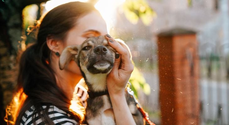 women hugging rescue dog